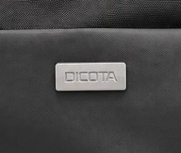 Metal DICOTA plate on the front of a backpack